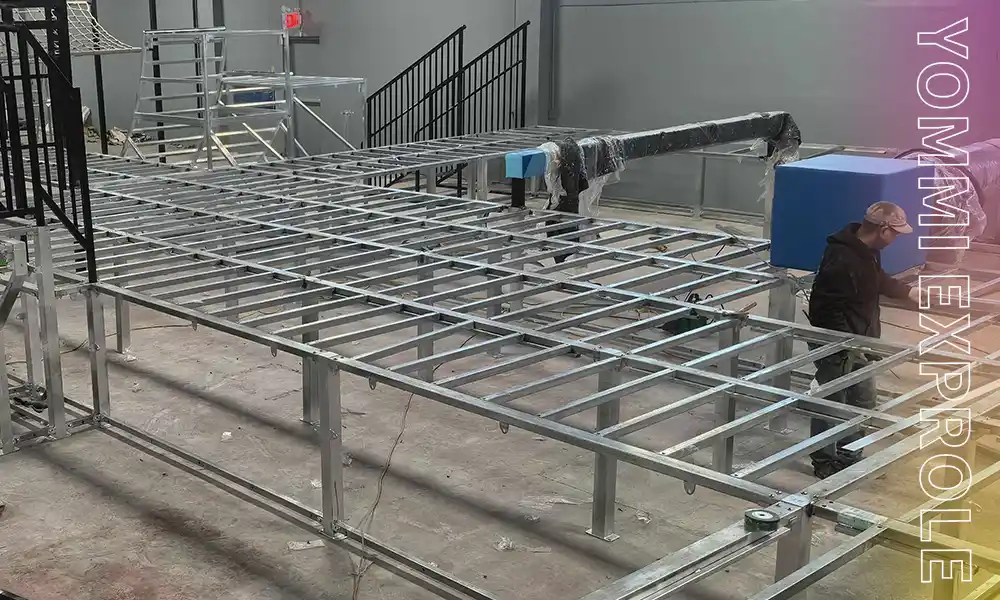Factory veterans executing precision structural engineering and steel frame installation for a commercial trampoline park to prevent future collapses.